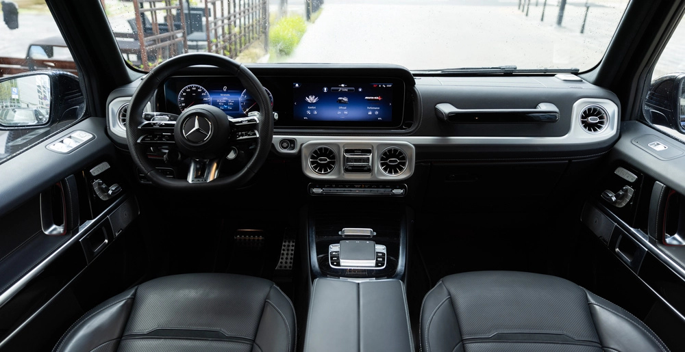 Mercedes G63 AMG LIFT interior — AMG steering wheel, digital cockpit and multimedia display with driving modes