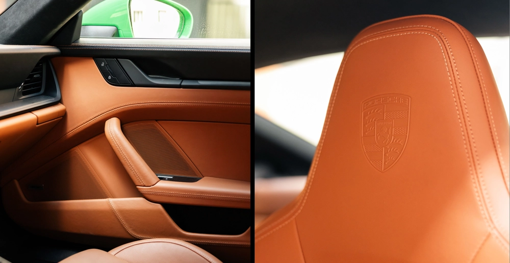 Porsche 911 Carrera GTS interior with panoramic roof and premium leather finish