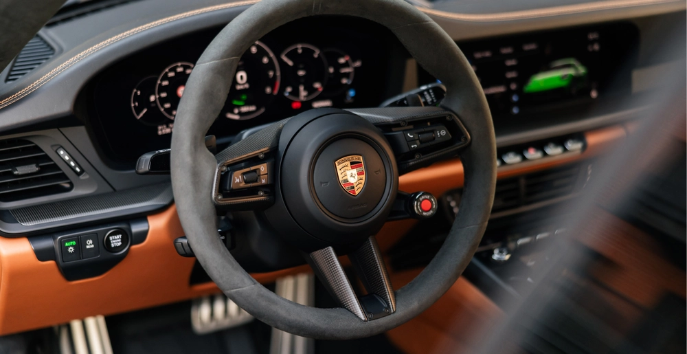 Porsche 911 Carrera GTS Alcantara steering wheel and digital cockpit interior