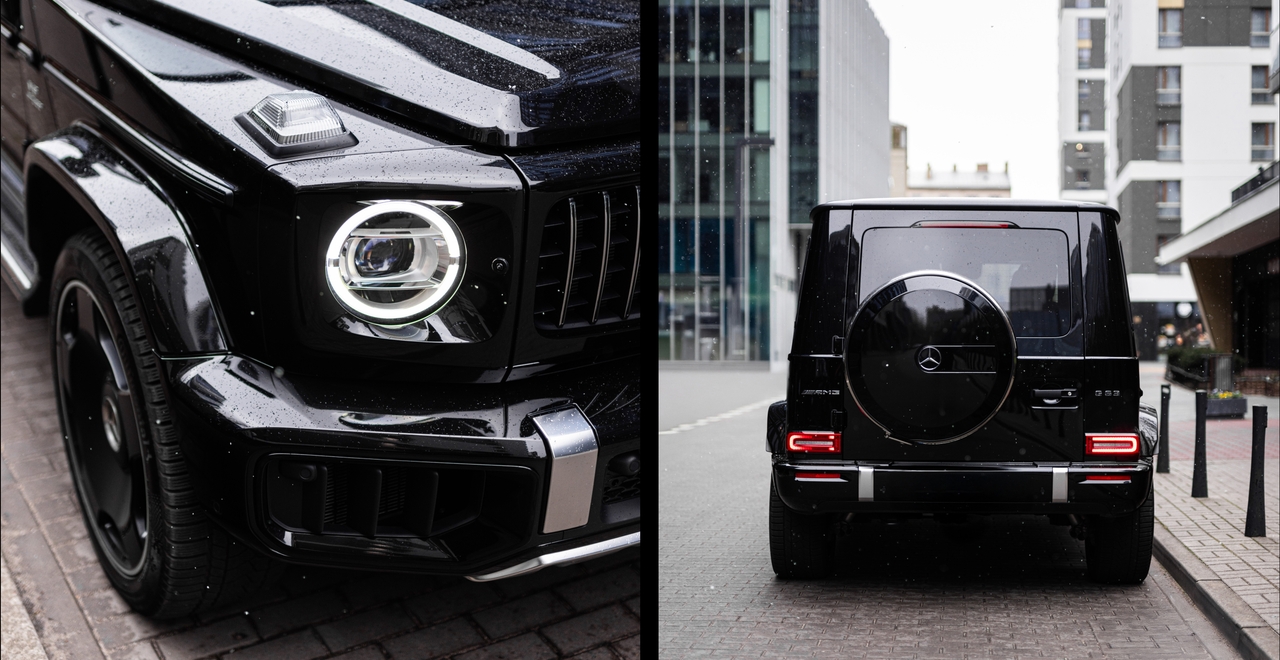 Przód i tył odświeżonego Mercedesa-AMG G 63: kultowe światła LED w formie pierścieni, masywna osłona chłodnicy Panamericana i czarne koło zapasowe z logo Mercedesa. Ikona stylu i mocy na ulicach miasta.
