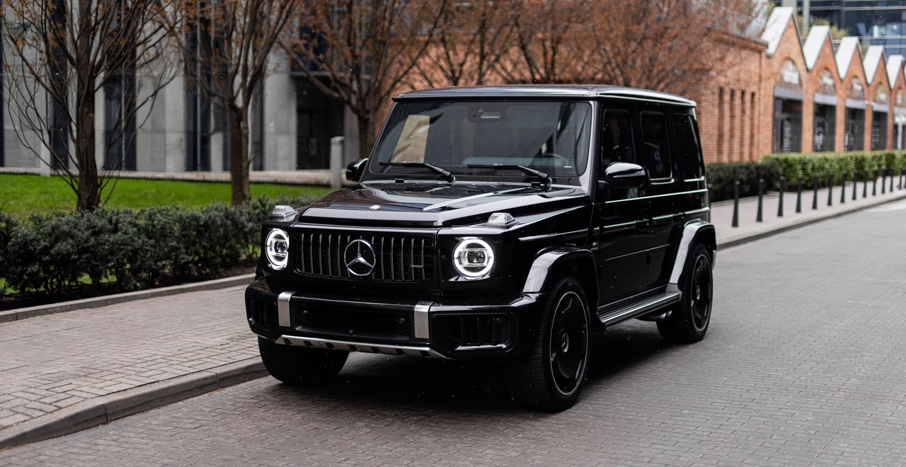 Mercedes G63 AMG LIFT — front view of black luxury SUV parked in Warsaw