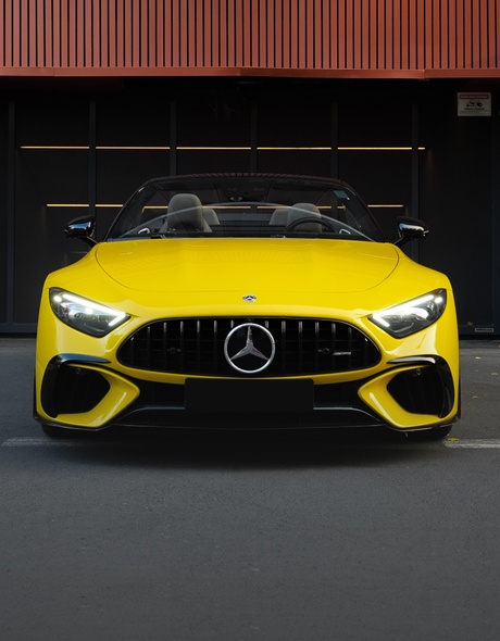 Front view of Mercedes SL55 AMG in bright yellow