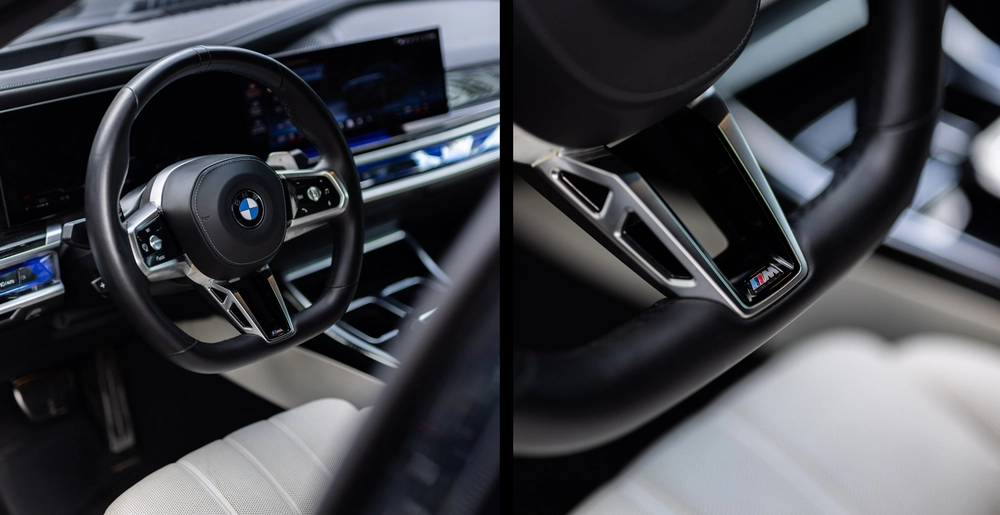 Steering wheel of the BMW 740d xDrive M Sport with M badge, leather trim and modern design. Premium in every detail – available at SK CARS Warsaw.